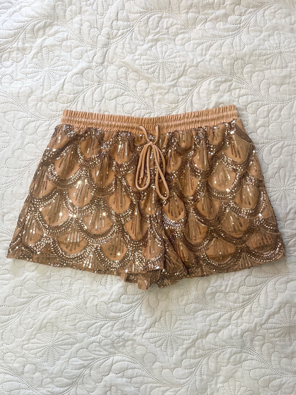 Living Doll Woman’s Sequin Champagne Shorts. 1